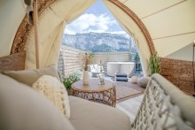 Weatherproof luxury lounge as hotel room for satisfied guests